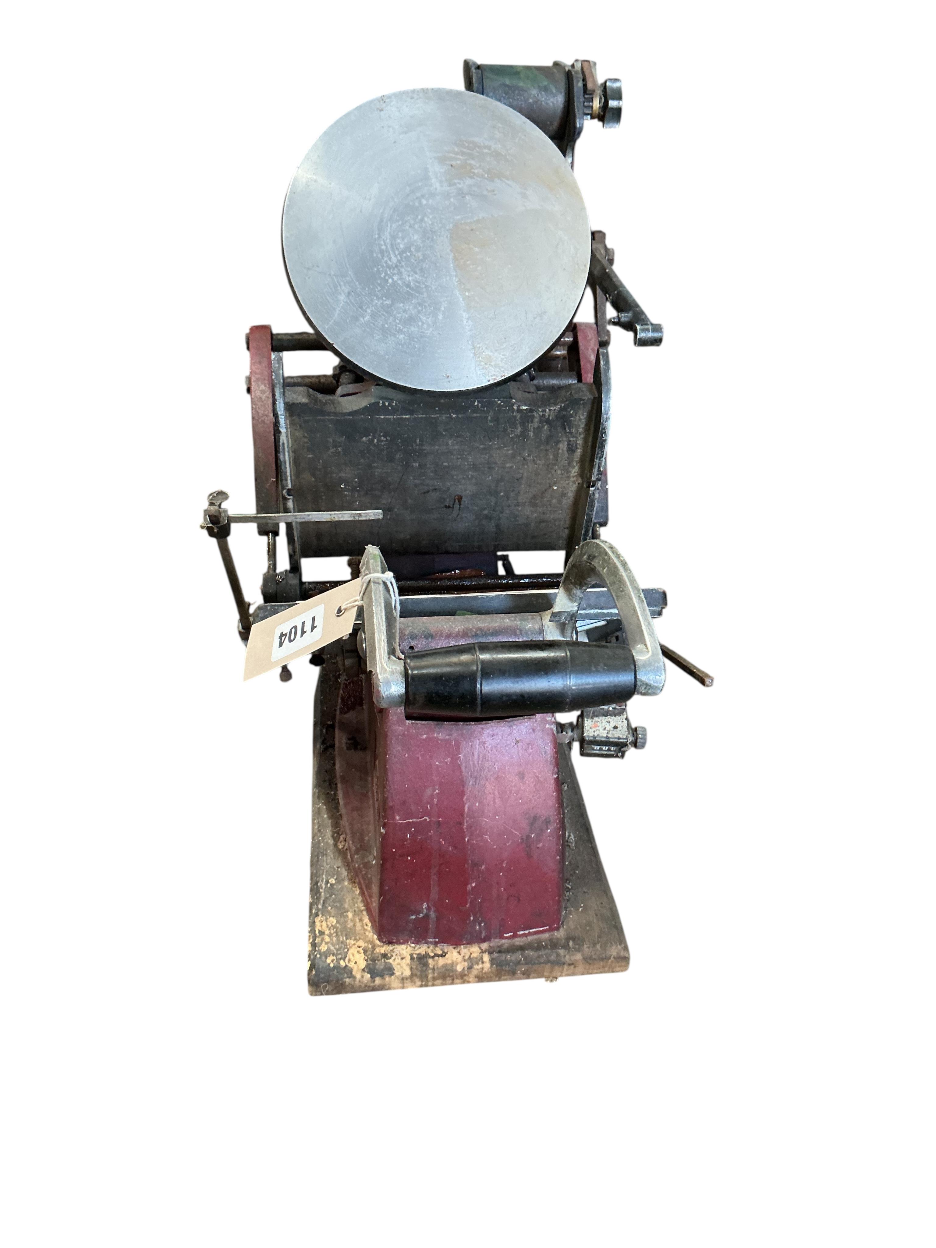 An Adana eight-five printing press with a large quantity of assorted type face, trays, accessories etc.